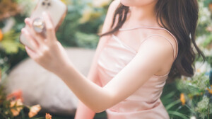 Asian Women Model Smartphone Selfies Flowers Sitting Plants Smiling Pink Dress Long Hair Red Lipstic 1365x2048 Wallpaper