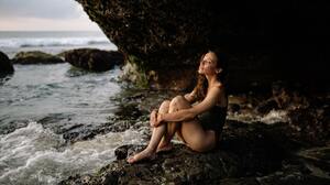 Women Rocks Water Brunette Wavy Hair Sitting Pierced Pierced Nose Waves Sunset Bent Legs Cave Long H 6000x4000 Wallpaper