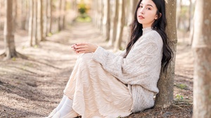 Asian Women Model Sitting Looking At Viewer Outdoors Women Outdoors Brunette Long Hair Sweater Paint 3840x2555 Wallpaper