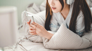 Asian Women Model Indoors Women Indoors Headphones Smartphone Looking Away In Bed Brunette Long Hair 1366x2048 wallpaper