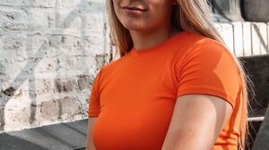 Crop Top Blonde Orange Clothing Looking Away Women Outdoors Urban Long Hair Orange Tops Sitting Wome 1080x1350 Wallpaper
