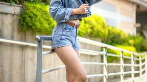 Asian Model Women Women Outdoors Long Hair Dark Hair Denim Jacket Leaning Sneakers Bushes Depth Of F 1280x1920 Wallpaper