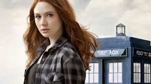 Karen Gillan Doctor Who TARDiS Amy Pond Women Actress Redhead Plaid Shirt Hair Blowing In The Wind 1024x768 Wallpaper