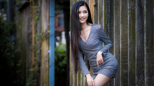 Asian Model Women Long Hair Dark Hair Leaning Bushes Fence 3840x2560 Wallpaper