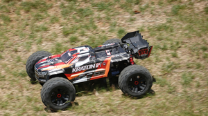RC Car Buggy Remote Control Toys Blurred Blurry Background Grass Traxxas 2160x1440 wallpaper