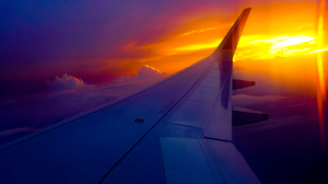 Flight Clouds Sun Rays Dusk Aircraft Sunset 6000x4000 Wallpaper