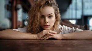 Aleksandr Kurennoi Women Brunette Blue Eyes Resting Head Table Portrait Face Thick Eyebrows Closeup 2048x1366 wallpaper